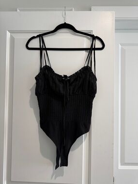 NWOT Black Smocked Chiffon Bodysuit with pleated ruffle detail